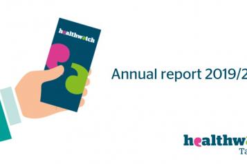 Image of annual report being held in hand
