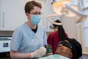 Photo of dentist and patient