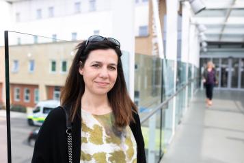 Women standing outside hospital 